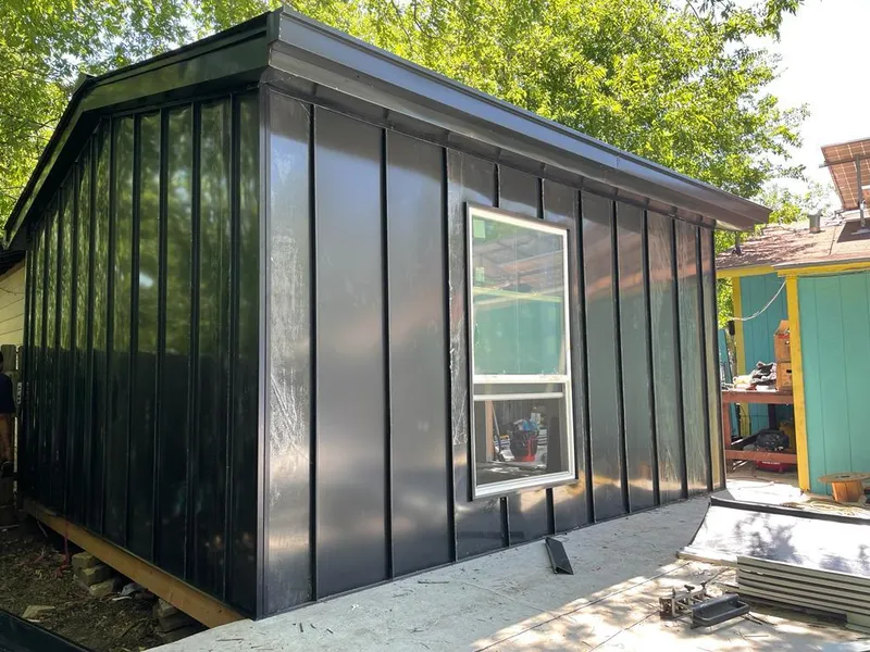 Black standing seam metal wall panels for Roof Inspection in Sudbury