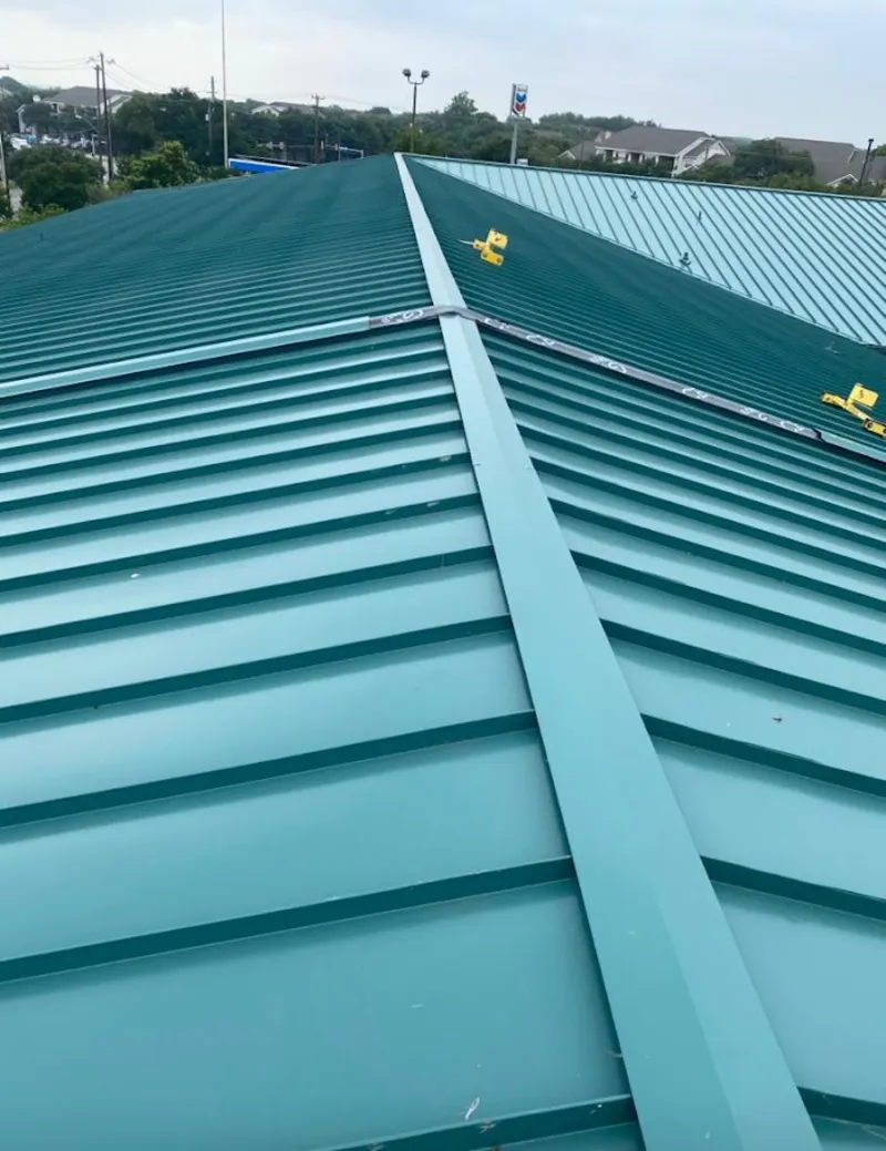 Green commercial metal roof ridge and valley for Metal Roof Repair in Sudbury