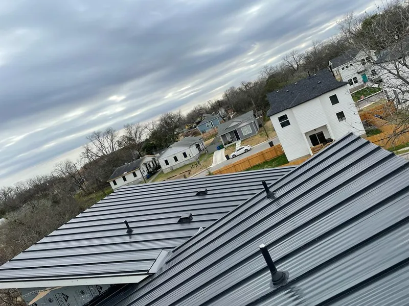 Standing seam metal roof panels with vents for Skylight Repair in Sudbury